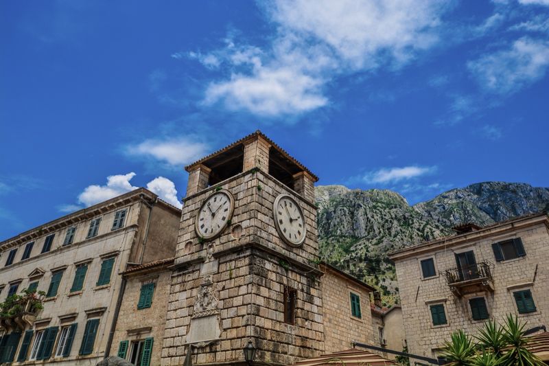 The clock tower on the Square of Arms.